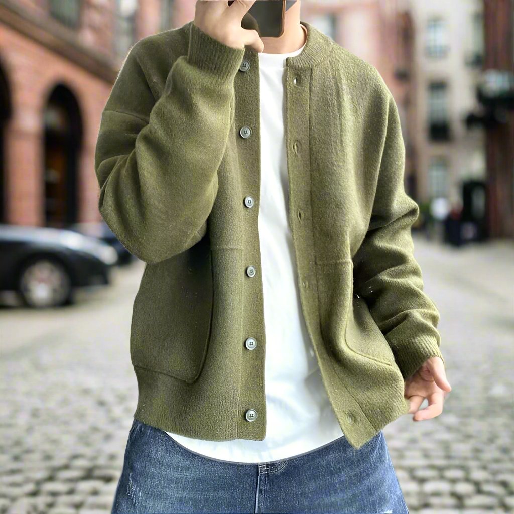 Modern man wearing Aaron stylish cardigan in olive green, perfect for both casual and formal occasions, showcasing timeless style.