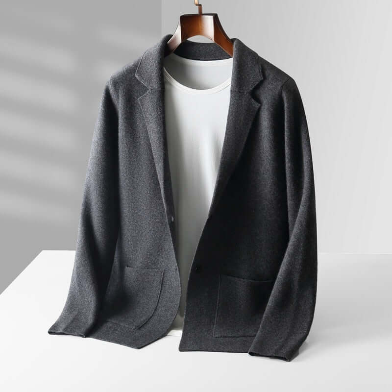 Stylish dark gray ELIJAH blazer on hanger showcasing classic elegance and soft, breathable fabric for all-day comfort.