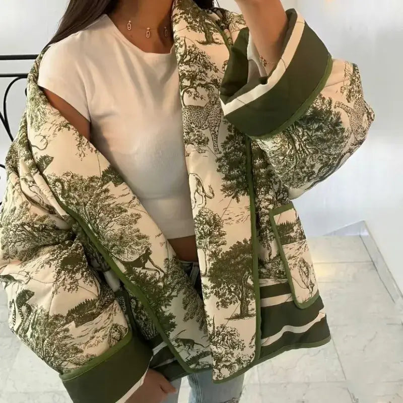 Swannie Jacket in green and cream with nature print, perfect for autumn fashion, showcasing comfort and detailed design.